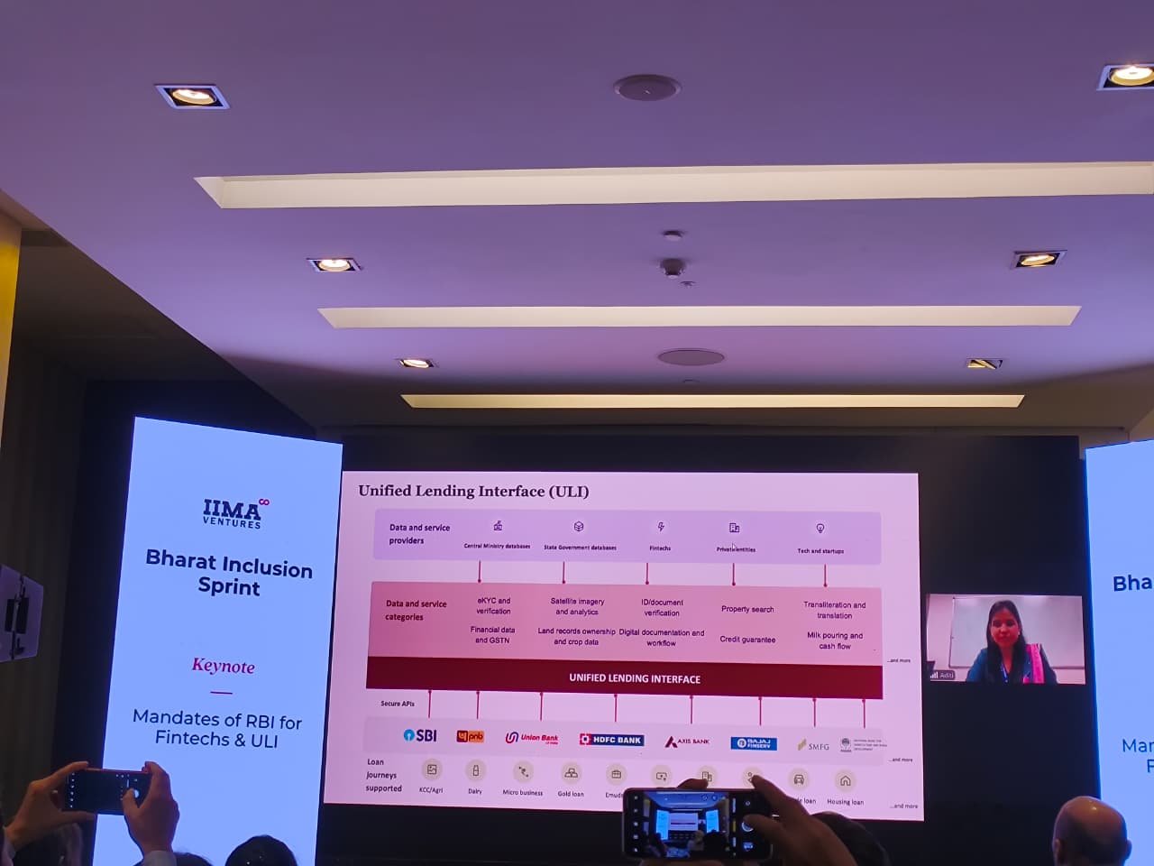 Keynote slide titled Unified Lending Interface, showing data providers and data categories feeding into ULI, which connects to lenders such as SBI, PNB, HDFC Bank and Axis Bank, with the speaker on a video feed beside it